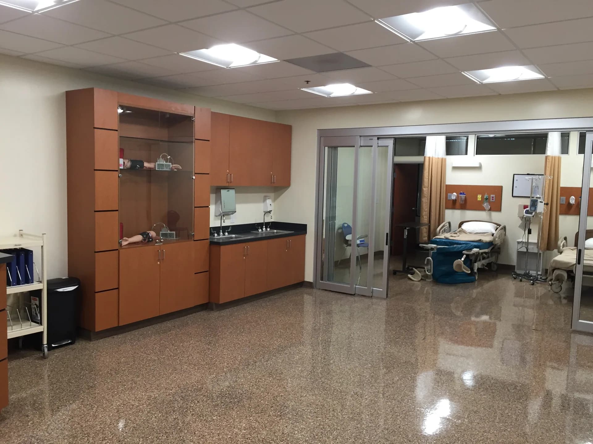 Simulation beds and healthcare equipment in a CCI Lancaster nursing skills lab.
