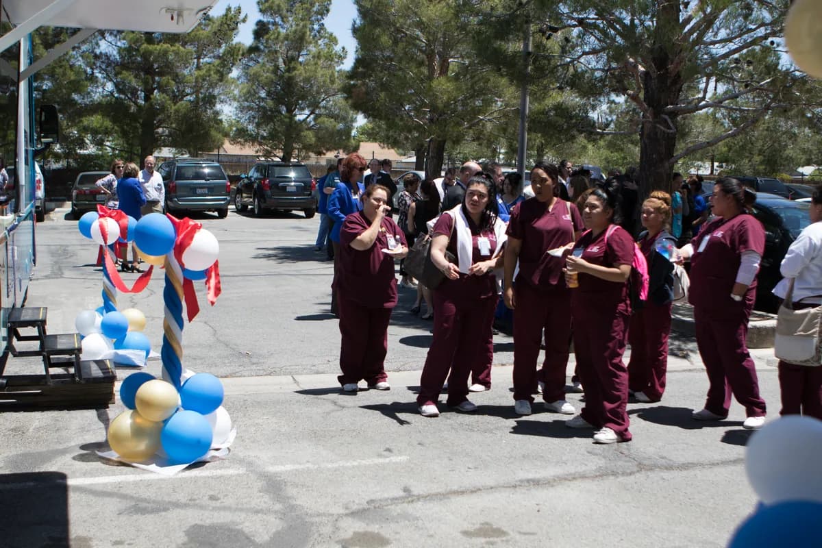 CCI students gathered for an appreciation event beside the CCI Mobile Health Unit