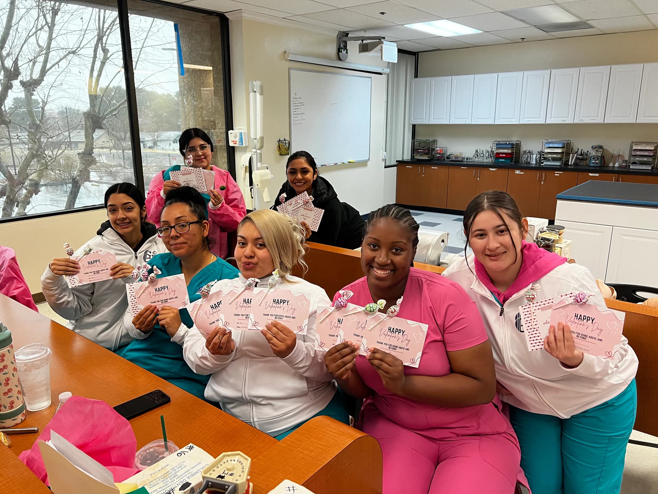 Dental Assisting students gather together in their Lancaster classroom.