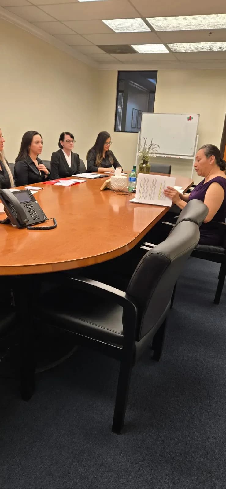 A mock interview facilitator reviewing feedback with CCI students